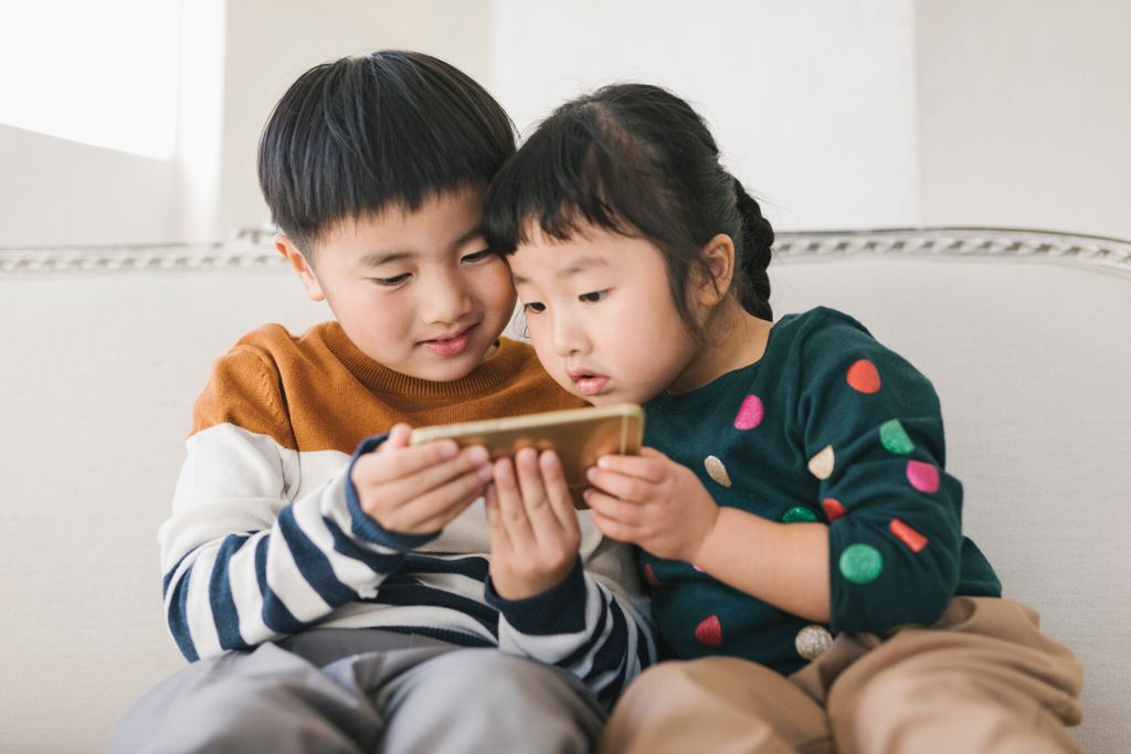 child using a smartphone
